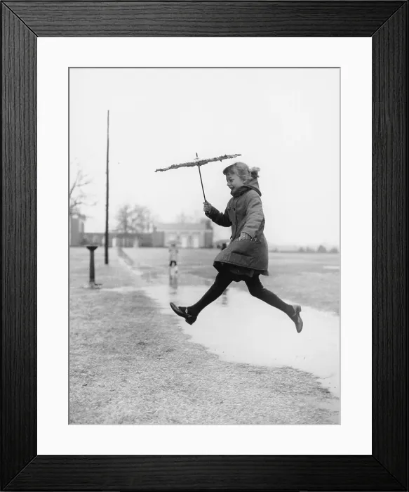 Framed Print : Jumping over Puddle Framed Print : Jumping over Puddle