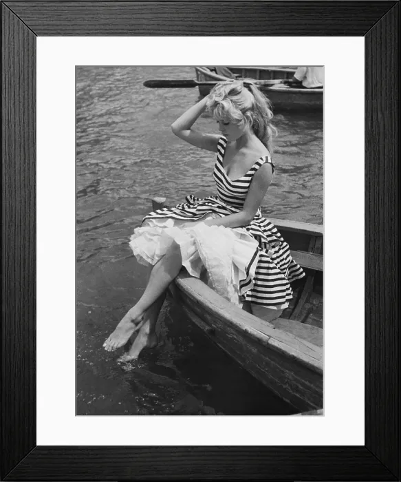 Framed Print : Young Brigitte Bardot Sitting on a Boat, Actress and Sex Symbol Framed Print : Young Brigitte Bardot Sitting on a Boat, Actress and Sex Symbol