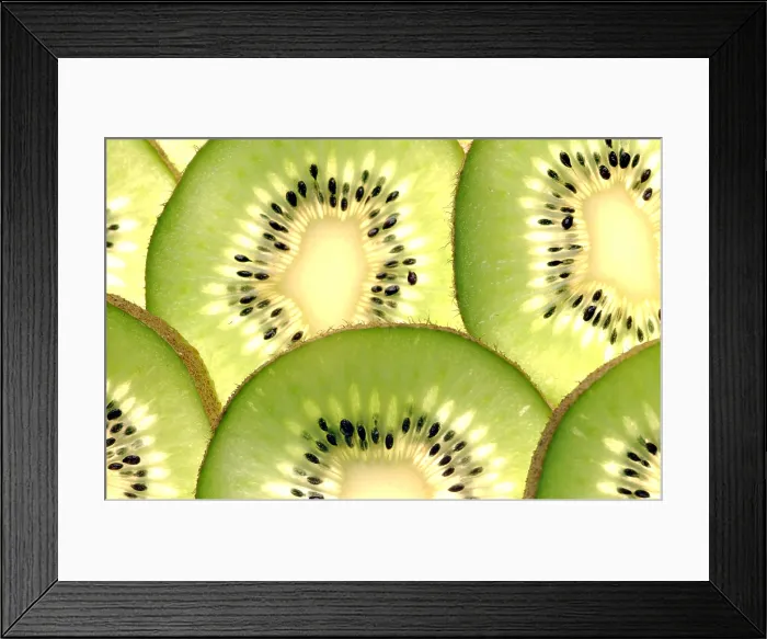 Framed Print : Kiwi. Slices of kiwi fruit, revealing the pattern of seeds inside Framed Print : Kiwi. Slices of kiwi fruit, revealing the pattern of seeds inside
