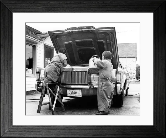 Framed Print : Dwarfs working on car