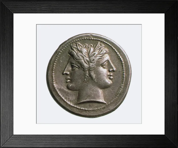 Framed Print : Janus. Bronze coin depicting Janus, twin-headed Roman god of beginnings Framed Print : Janus. Bronze coin depicting Janus, twin-headed Roman god of beginnings