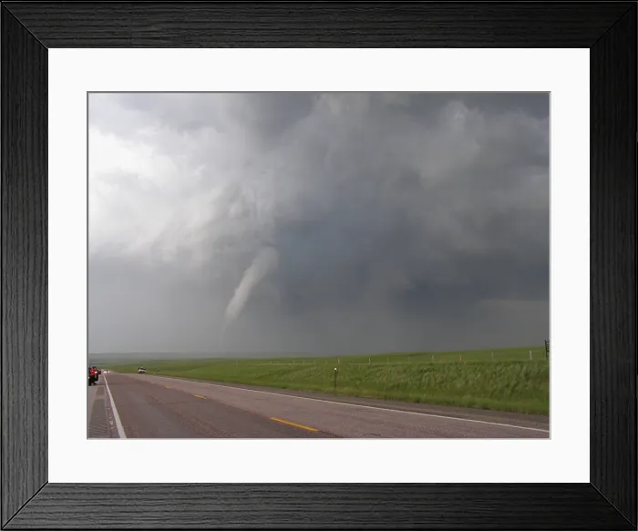 Framed Print : Tornado. A tornado is a violent, dangerous, rotating column of air that