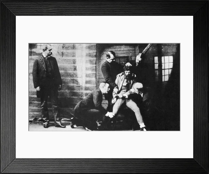 Framed Print : Criminal Being Held Down For Mug Shot, New York, 1884 Framed Print : Criminal Being Held Down For Mug Shot, New York, 1884
