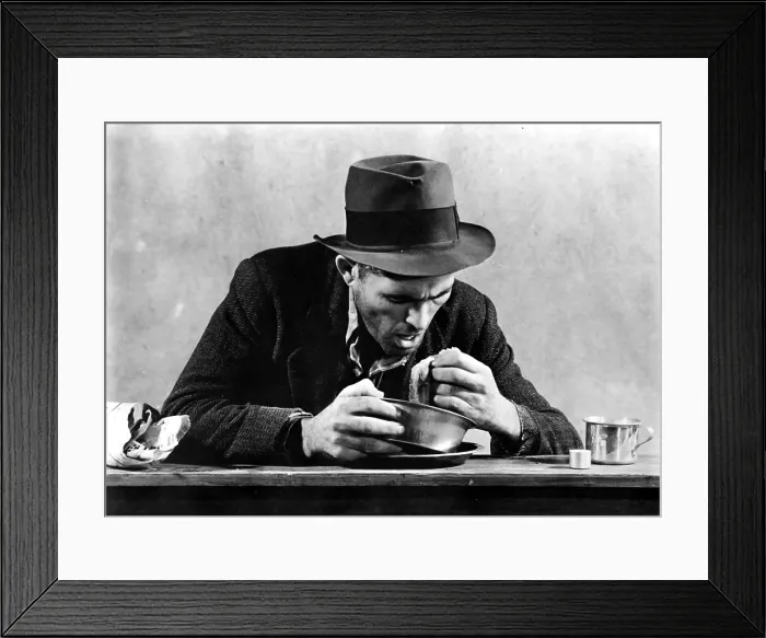 Framed Print : Homeless Man Eating in a Soup Kitchen Framed Print : Homeless Man Eating in a Soup Kitchen
