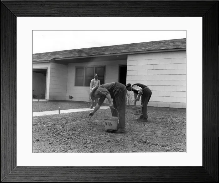 Framed Print : Men Seeding a Lawn Framed Print : Men Seeding a Lawn
