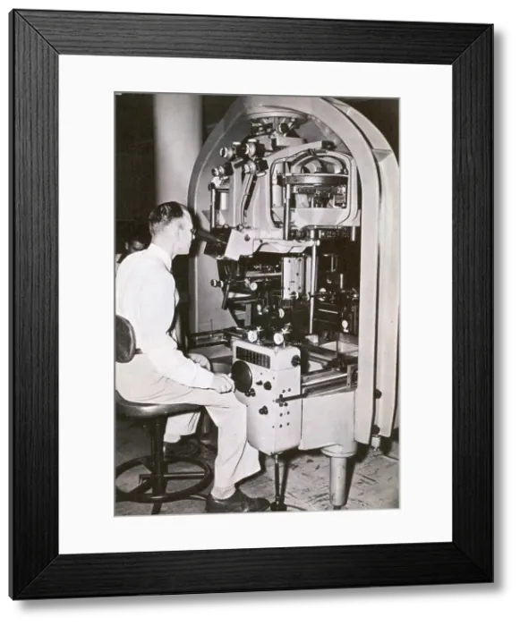 Framed Print : Man Using a Historical Cartography or Map Making Machine, Stereoplanigrah Framed Print : Man Using a Historical Cartography or Map Making Machine, Stereoplanigrah