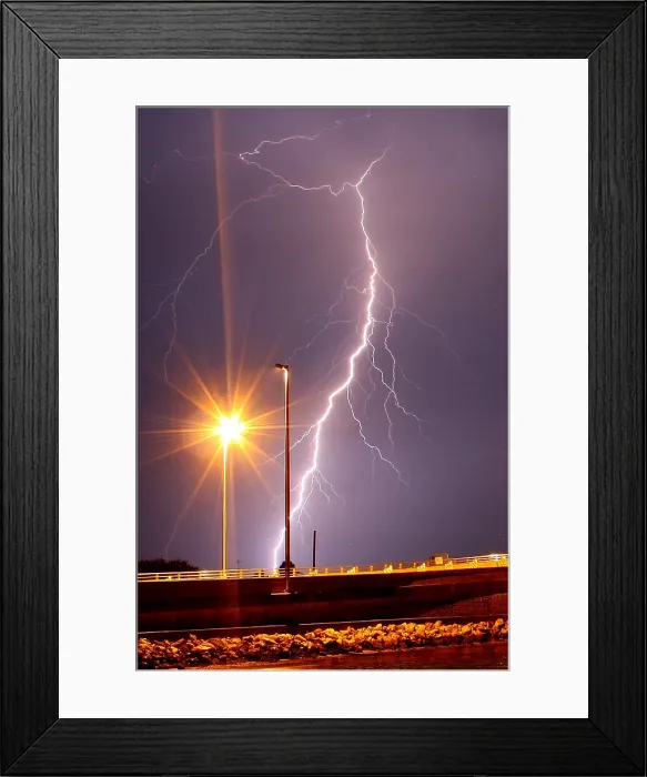 Framed Print : Lightning somewhere in Florida. Lightning is a flash of light in the sky Framed Print : Lightning somewhere in Florida. Lightning is a flash of light in the sky