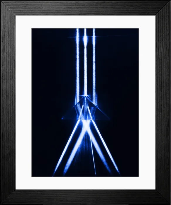 Framed Print : Prism. Color enhanced photograph of light refracted as it passes through a prism