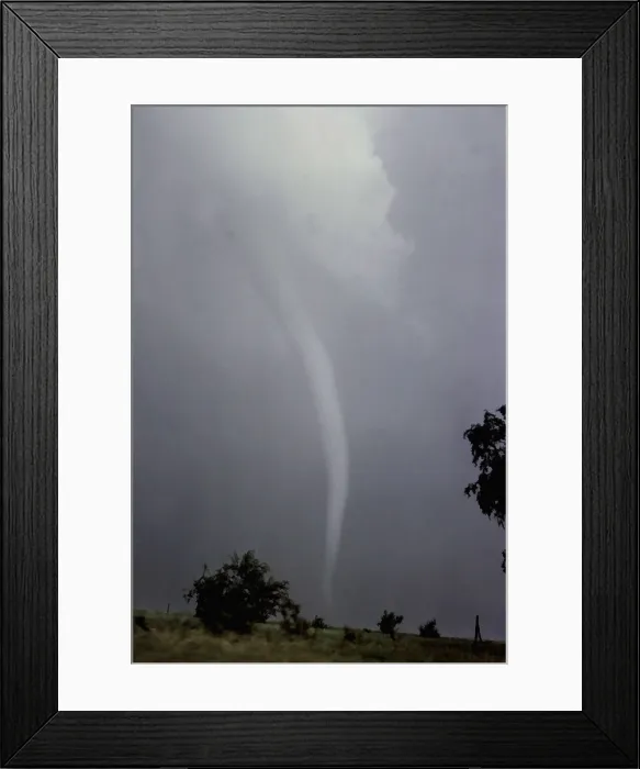 Framed Print : Tornado. A tornado is a violent, dangerous, rotating column of air that