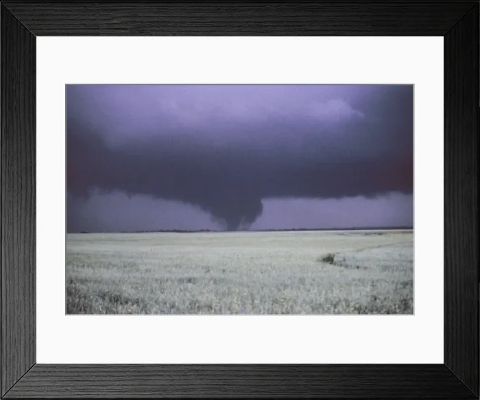 Framed Print : Tornado. A tornado is a violent, dangerous, rotating column of air that