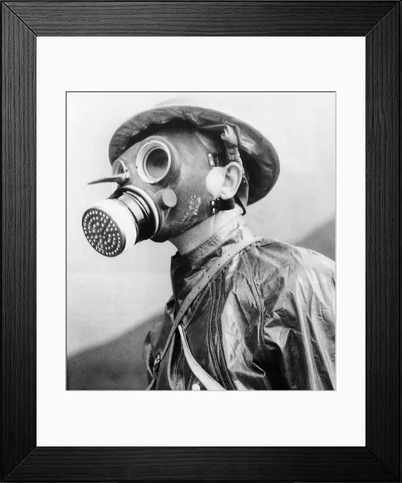 Framed Print : Gas Masks. British soldier wearing a gas mask Framed Print : Gas Masks. British soldier wearing a gas mask