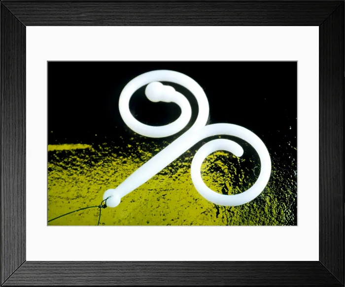 Framed Print : Macrophoto of an intrauterine device