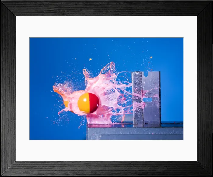 Framed Print : Paintball Shot at Razor Blade Framed Print : Paintball Shot at Razor Blade