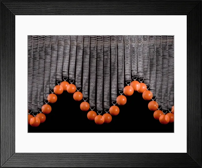 Framed Print : Ball Bouncing on a Spring Framed Print : Ball Bouncing on a Spring