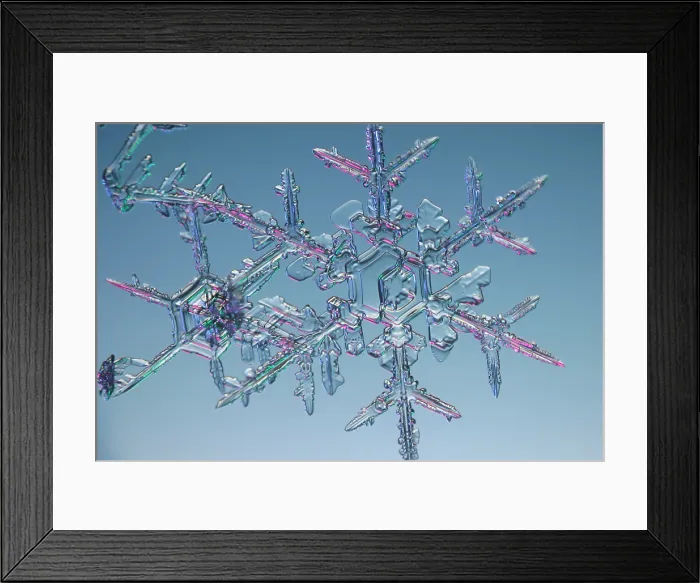 Framed Print : Snowflake. A snowflake or a snow crystal Framed Print : Snowflake. A snowflake or a snow crystal