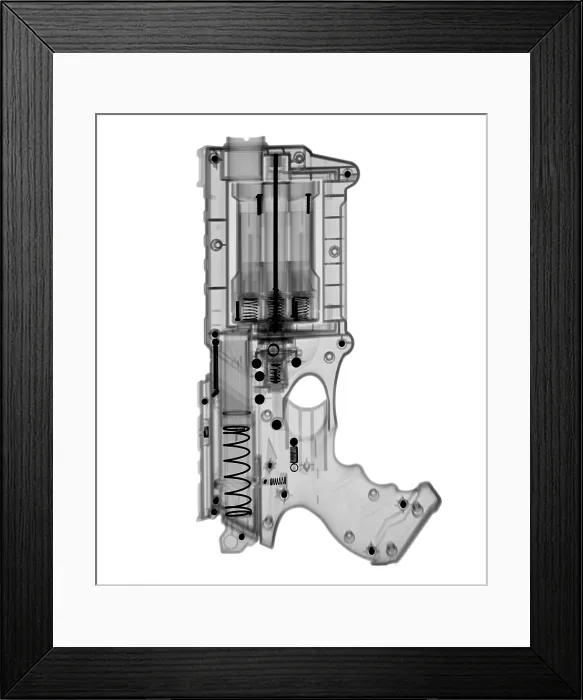 Framed Print : An X-ray of a toy gun Framed Print : An X-ray of a toy gun