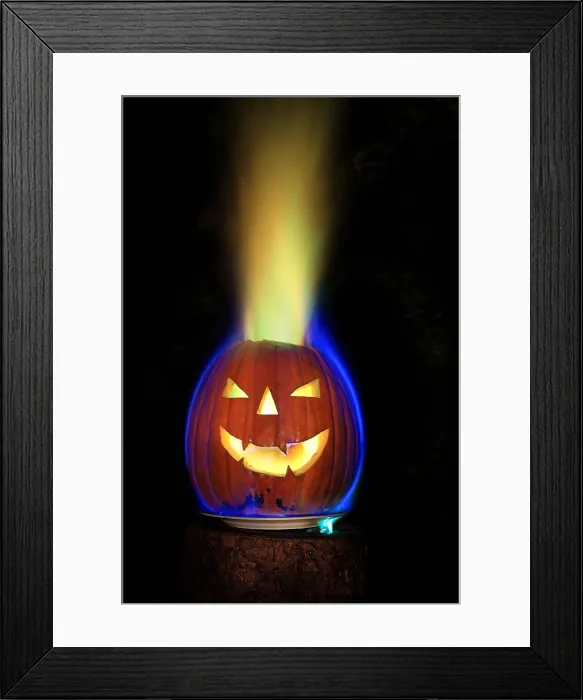 Framed Print : Colored Flame in Burning Pumpkin Framed Print : Colored Flame in Burning Pumpkin