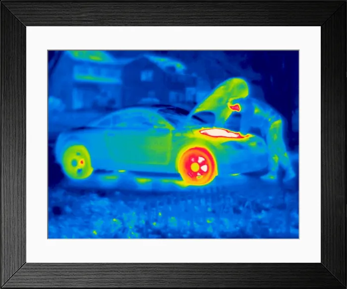 Framed Print : A thermogram of a man working on a car Framed Print : A thermogram of a man working on a car