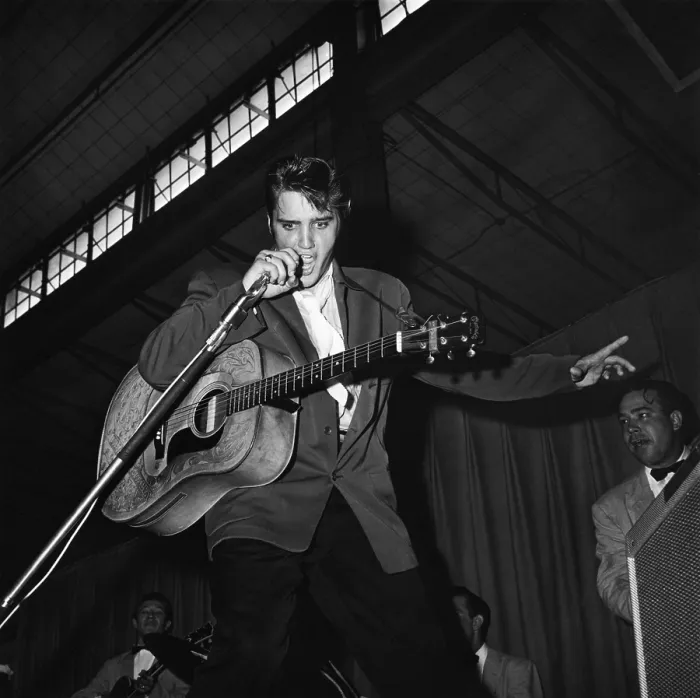 Framed Print : Elvis. American singer Elvis Presley (1935 - 1977) performs with trademark Framed Print : Elvis. American singer Elvis Presley (1935 - 1977) performs with trademark