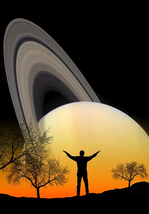 Framed Print : Astronomy. An amateur astronomer looking at Saturn Framed Print : Astronomy. An amateur astronomer looking at Saturn
