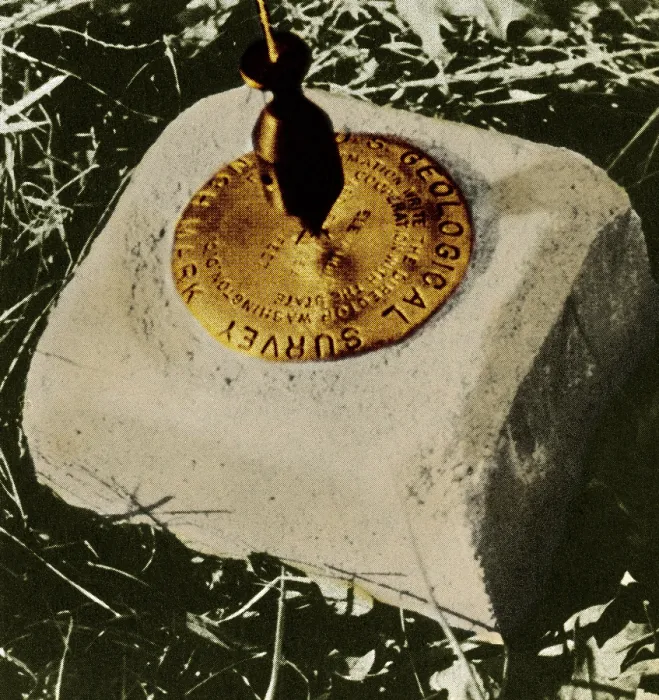 Framed Print : Benchmark. Close up of a benchmark, with a surveyor's plumb-bob visible, hanging above Framed Print : Benchmark. Close up of a benchmark, with a surveyor's plumb-bob visible, hanging above