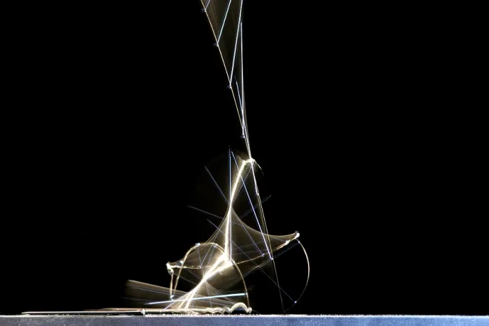 Framed Print : High speed strobe image of pin dropping Framed Print : High speed strobe image of pin dropping