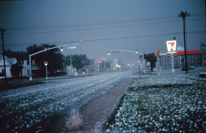 Framed Print : Hail. Large hail collects on streets and grass during severe thunderstorm Framed Print : Hail. Large hail collects on streets and grass during severe thunderstorm