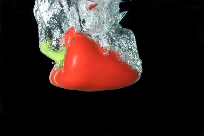 Framed Print : Red Pepper falling into water Framed Print : Red Pepper falling into water