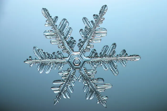 Framed Print : Snowflake. A snowflake or a snow crystal Framed Print : Snowflake. A snowflake or a snow crystal