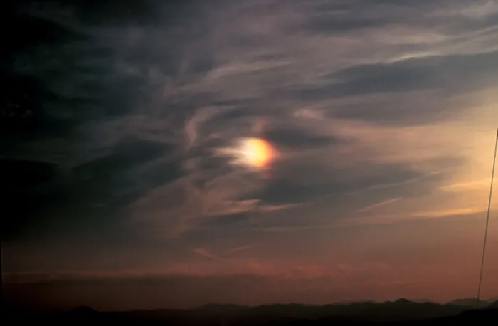 Framed Print : Sun Dog. Parhelion or 'sun dog' to the left of the sun Framed Print : Sun Dog. Parhelion or 'sun dog' to the left of the sun