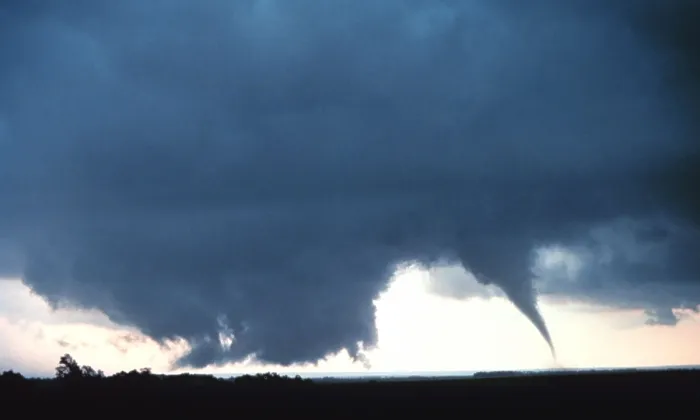 Framed Print : Tornado. A tornado is a violent, dangerous, rotating column of air that