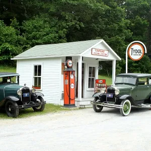 Antique Cars Print: Vintage Vehicles in Front of a 1930s Tydol Gas Station