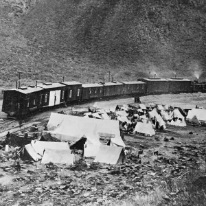 Print of Chinese laborer camp and construction headquarters train, 1868