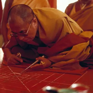 Print of the Dalai Lama drawing a sand mandala