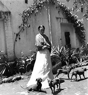 Misc Prints: Artist Frida Kahlo with her pet dogs, Mexico
