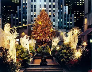 Statues Prints: Christmas Tree at Rockefeller Center, NYC