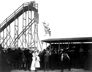Prints of Entitled: 'The daring ride of Mrs. Eunice (Winkless) Padfield' shows large crowd of spectators watching Padfield and horse diving from high tower : Diving Horse Stunt, Vintage, History, 1905