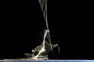 Drop Prints: High speed strobe image of pin dropping