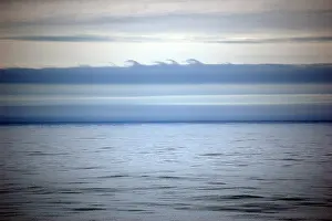 Friction Prints: Kelvin-Helmholtz Wave Clouds