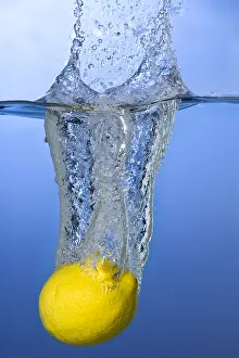 Mixed Science Images Prints: Lemon Dropped in Water