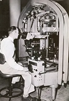 Cartography Prints: Man Using a Historical Cartography or Map Making Machine, Stereoplanigrah