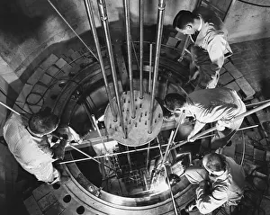 Prints of 'Fuel elements are loaded into the core of General Electric Company's Vallecitos developmental boiling water reactor : Men Loading Fuel into the Core of the Vallecitos Nuclear Center, California, C. 1960