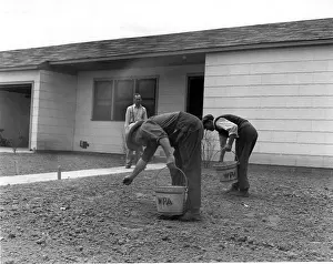 Grass Prints: Men Seeding a Lawn