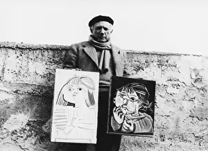 Picasso with Paintings, 1951