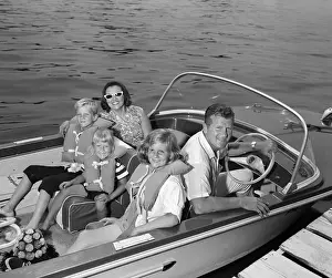 Prints of Smiling family of five in docked boat children wearing life vests looking at camera. Circa 1960s : Smiling Family In Docked Boat, Vintage, Summer Fun, C.1960s