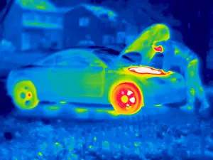 Cold Prints: A thermogram of a man working on a car