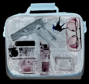 Weapon Prints: X-ray of a briefcase with a gun